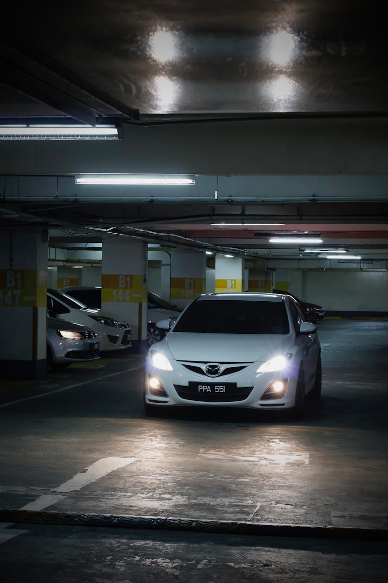 a group of cars parked in a parking garage